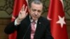 FILE - Turkey's President Recep Tayyip Erdogan addresses local administrators, in Ankara, Feb. 8, 2017.
