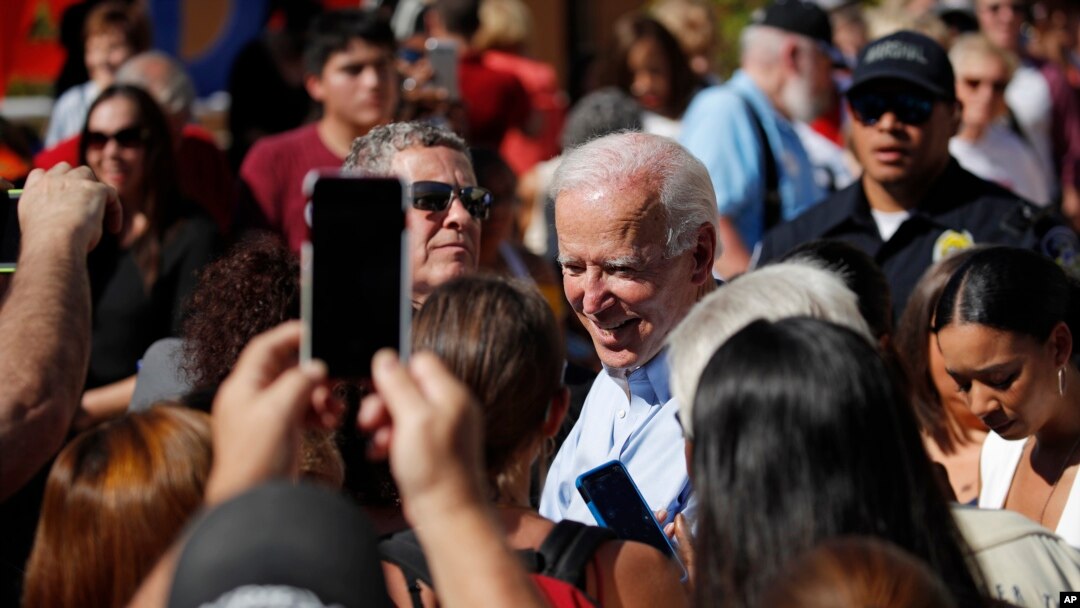 Democratic presidential candidate former Vice President Joe Biden meets with people at a campaign event, Sept. 27, 2019, in Las Vegas.