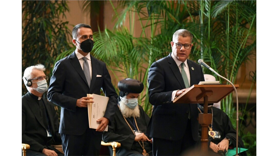 President of the 2021 United Nations Climate Change Conference, COP26, Alok Sharma, right, and Italian Foreign Minister Luigi Di Maio attend a conference at the Vatican, Oct. 4, 2021.