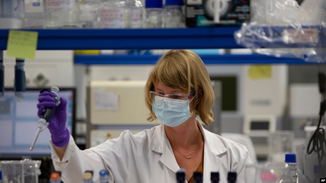 A lab technician works during research on coronavirus, COVID-19, at Johnson & Johnson subsidiary Janssen Pharmaceutical in Beerse, Belgium, Wednesday, June 17, 2020.