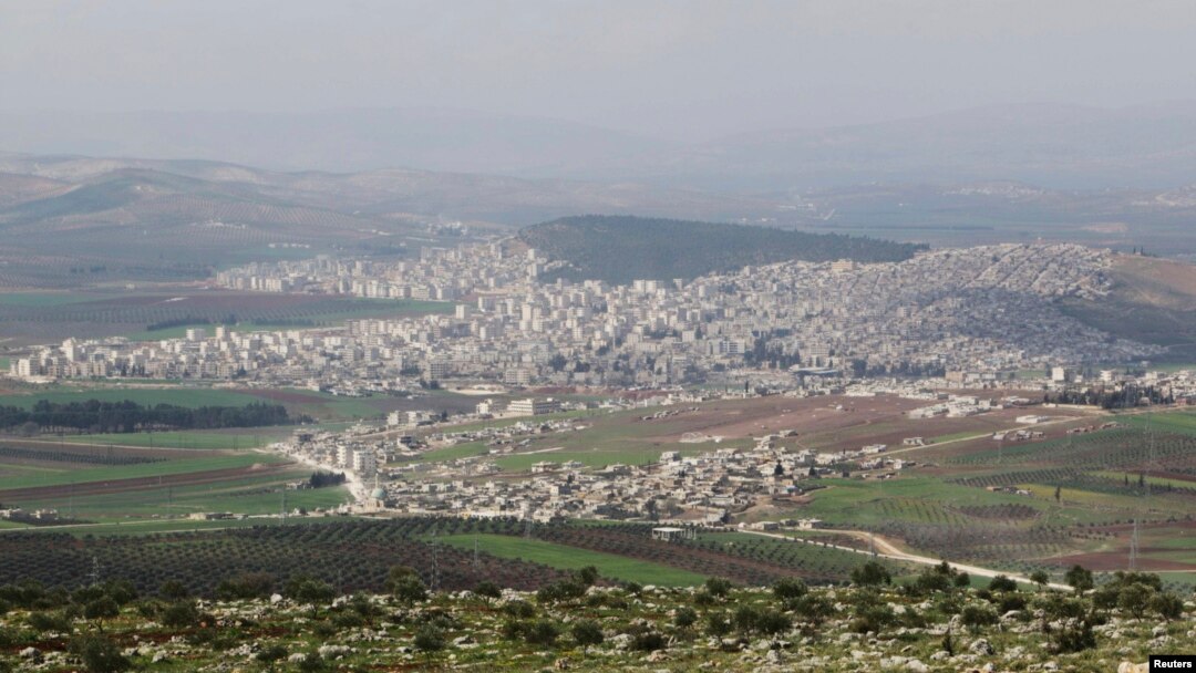 FILE - A general view shows the Kurdish city of Afrin, in Aleppo's countryside, March 18, 2015. 