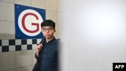 Pro-democracy activist and South Horizons community organizer Joshua Wong arrives at the Southern District Office of the Home Affairs Department, in Hong Kong, Oct. 24, 2019. 