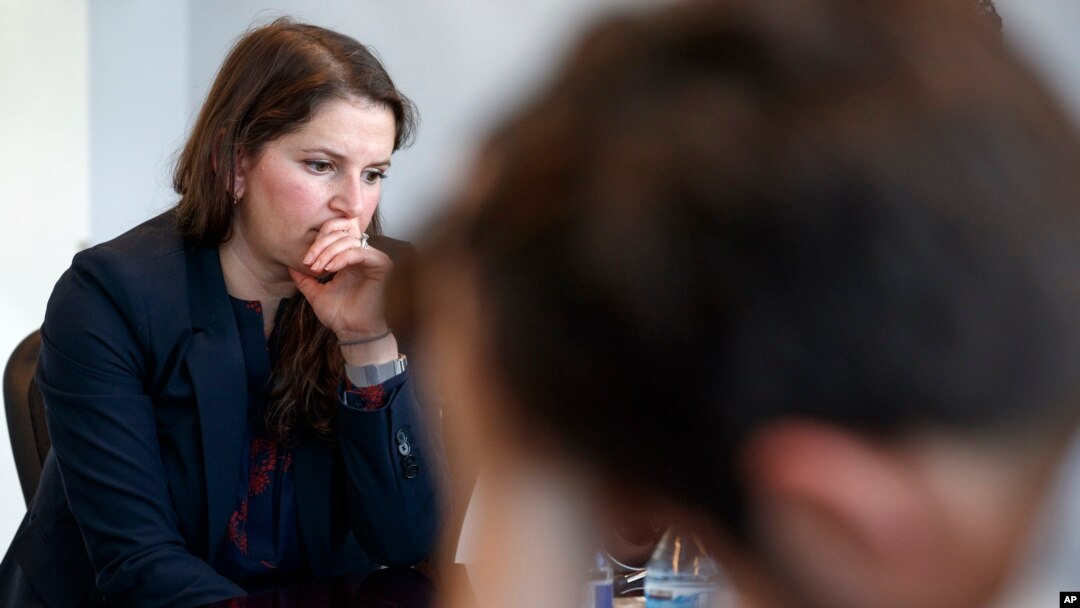 Sarah Moriarty, the daughter of Robert Levinson, a U.S. hostage in Iran, listens during a news conference in Washington, Dec. 3, 2019.