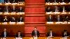 Chinese President Xi Jinping (center) listens during the opening session of the Chinese People's Political Consultative Conference in Beijing's Great Hall of the People, March 3, 2017. The head of China's legislative advisory body, Yu Zhengsheng, said Ch