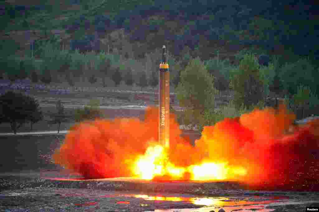 The long-range strategic ballistic rocket Hwasong-12 (Mars-12) is launched during a test in this undated photo released by North Korea's Korean Central News Agency (KCNA).