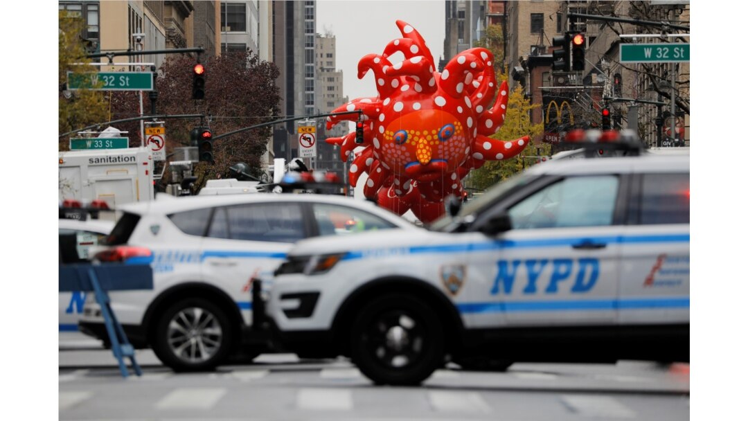 Yayoi Kusama's "Love Flies Up to the Sky" balloon is seen during the 94th Macy's Thanksgiving Day Parade, which was closed to spectators due to the spread of COVID-19, in Manhattan, New York City, November 26, 2020.