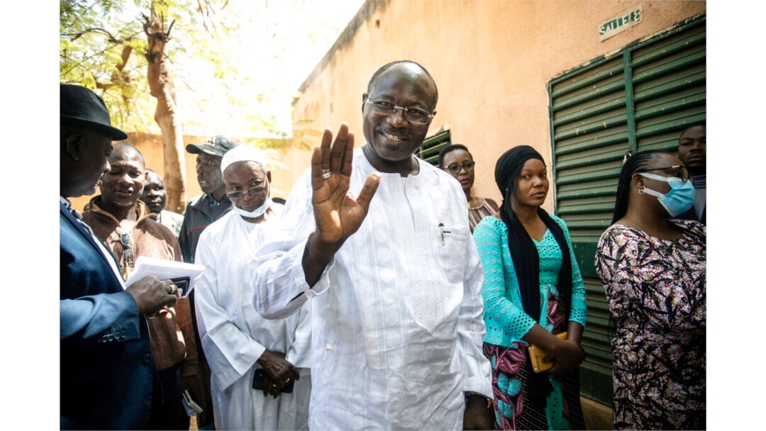 FILE - Burkina Faso opposition candidate Eddie Komboïgo votes in elections in Ouagadougo, Nov. 22, 2020.