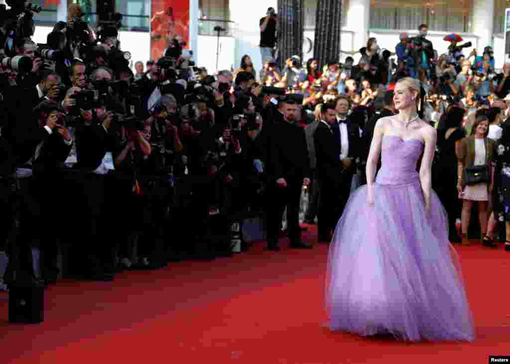 Cast member American actress Elle Fanning arrives for the screening of the film "The Beguiled" at the 70th Cannes Film Festival in Cannes, France, May 24, 2017.