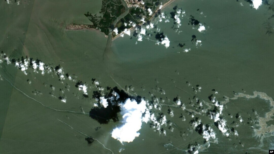 An oil slick is shown on Sept. 2, 2021, south of Port Fourchon, La. The U.S. Coast Guard said Sept. 4 that cleanup crews were responding to a sizable oil spill in the Gulf of Mexico following Hurricane Ida. (Maxar Technologies via AP)