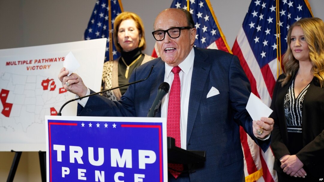FILE - Former Mayor of New York Rudy Giuliani, a lawyer for President Donald Trump, speaks during a news conference at the Republican National Committee headquarters, in Washington, Nov. 19, 2020.