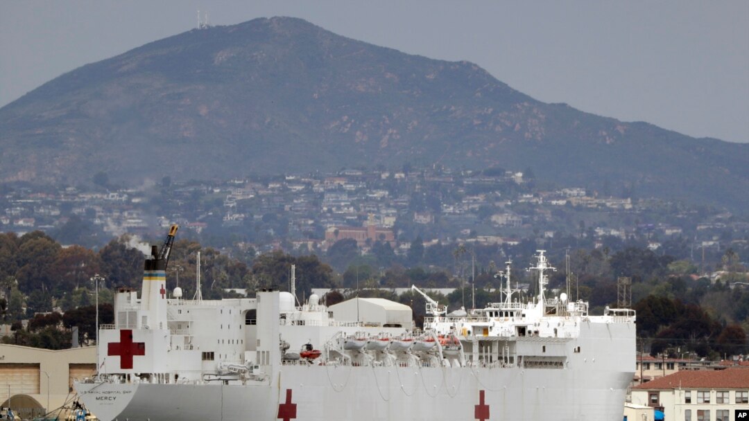 The USNS Mercy, a Navy hospital ship, is seen docked at Naval Base San Diego, March 18, 2020.