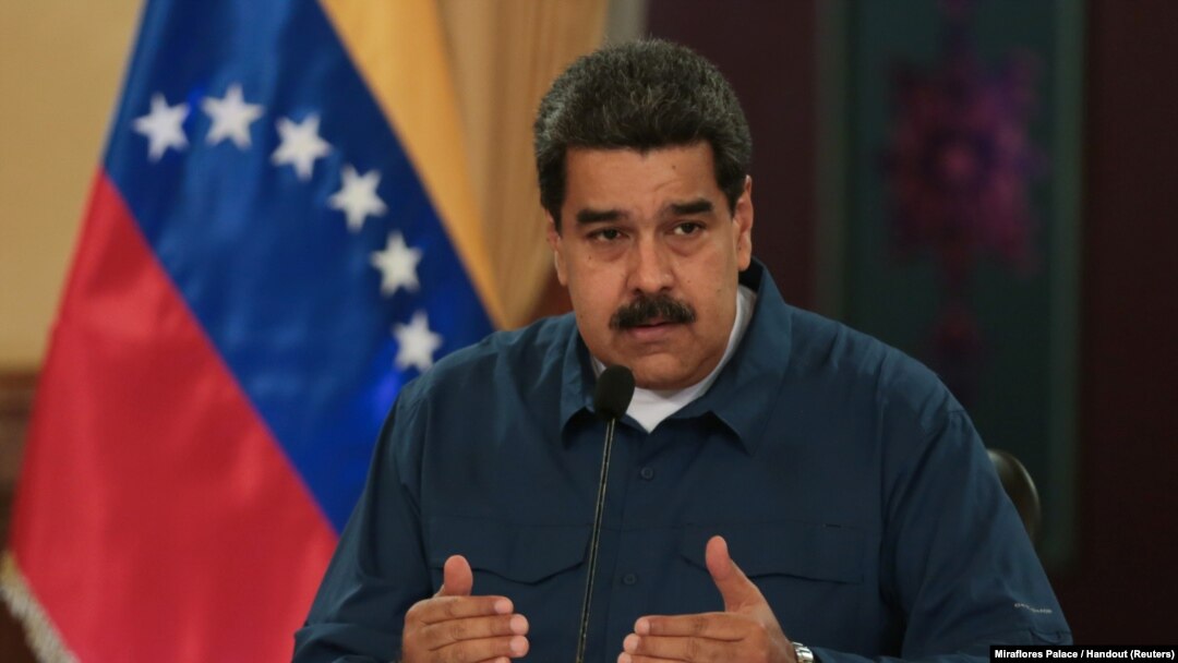 FILE - Venezuela's President Nicolas Maduro speaks during a meeting with ministers at the Miraflores Palace in Caracas, Venezuela, Aug. 13, 2018.