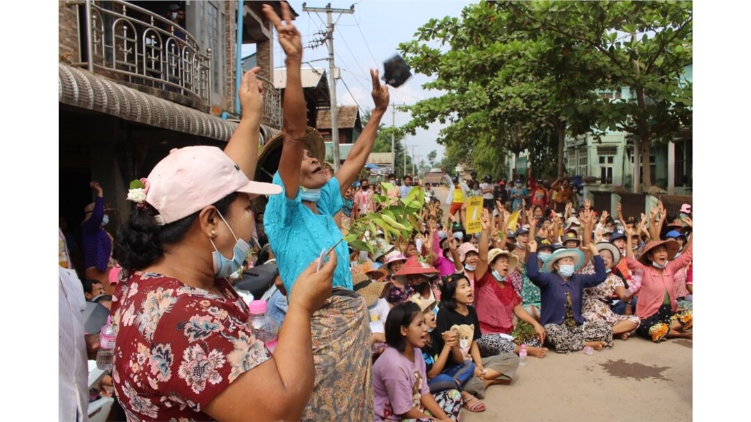 This handout photo taken and released by Dawei Watch on Apr.1, 2021 shows protesters making the three-finger salute during a demonstration against the military coup in Dawei. (Photo by Handout / Dawei Watch / AFP)