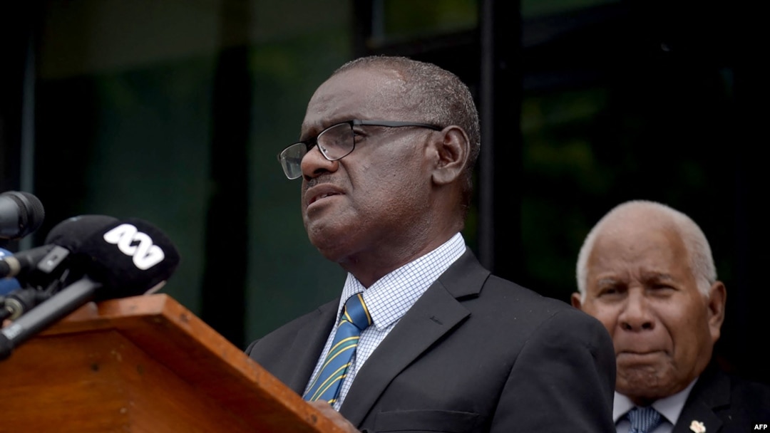 Solomon Islands’ newly elected Prime Minister Jeremiah Manele speaks during a press conference outside Parliament House in Honiara on May 2, 2024.