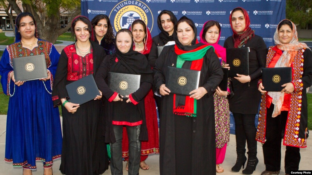 Graduates of the 2013 class of Project Artemis are seen with their diplomas. (Courtesy Thunderbird School of Global Management) 