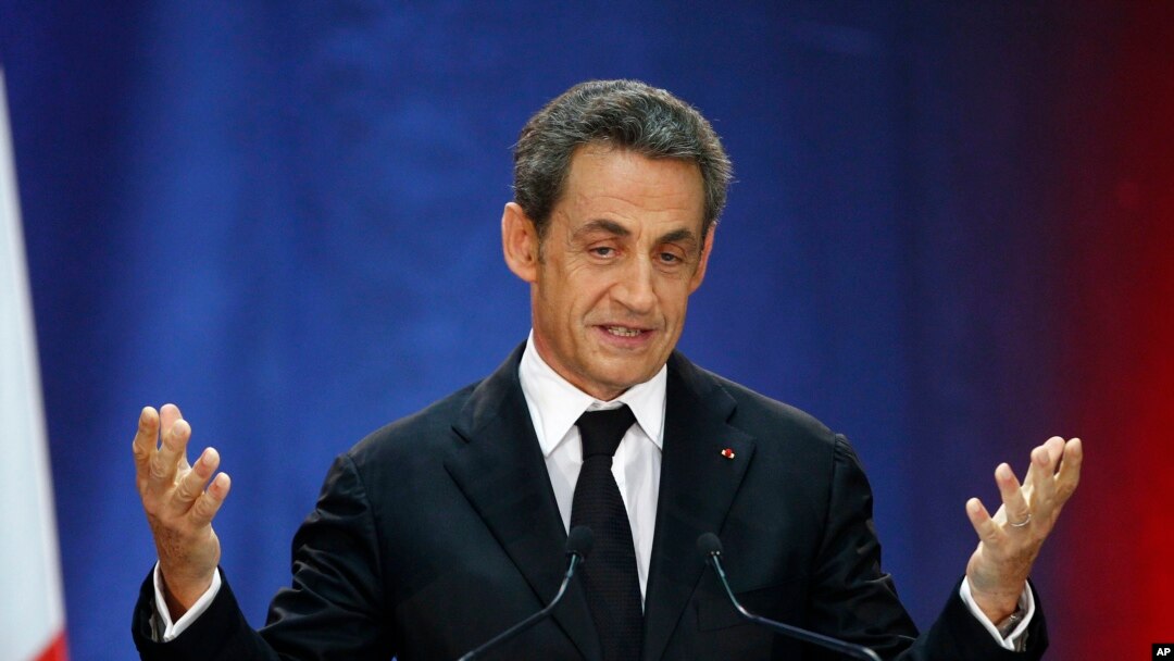 FILE- In this Sept. 25, 2014 file photo, former French President, Nicolas Sarkozy, speaks as part of his campaign for the leadership of his conservative UMP party in Lambersart, northern France. Sarkozy will run for next year's presidential election, he announced on his Facebook account on Monday.