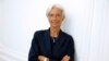 IMF chief Christine Lagarde poses on the sideline of a press conference, Aug. 27, 2014. 