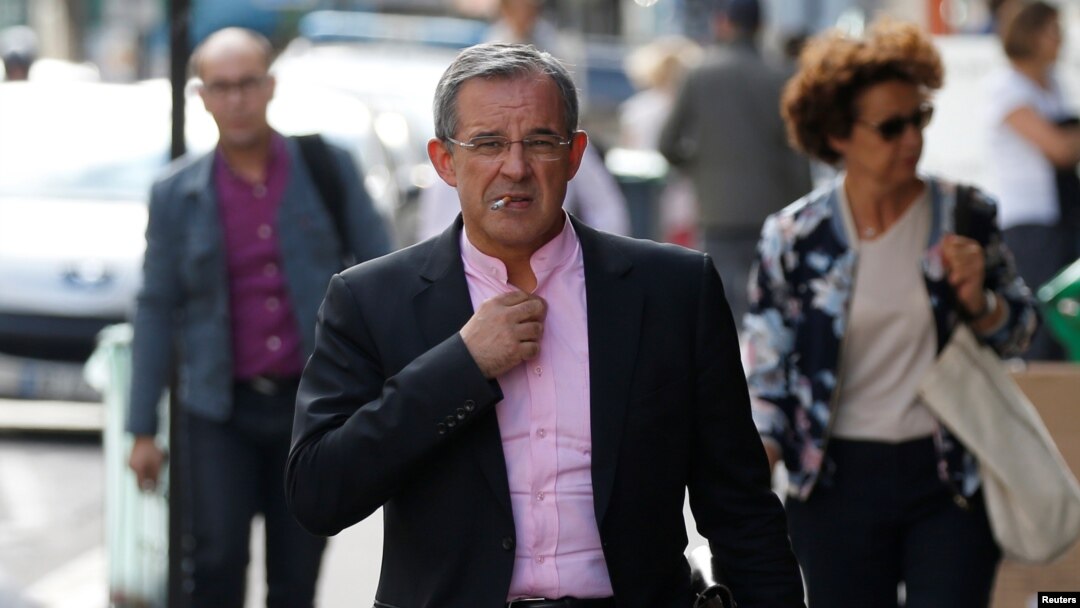 FILE - French conservative Les Republicains (LR) party member Thierry Mariani arrives at their political party headquarters in Paris, July 11, 2017.