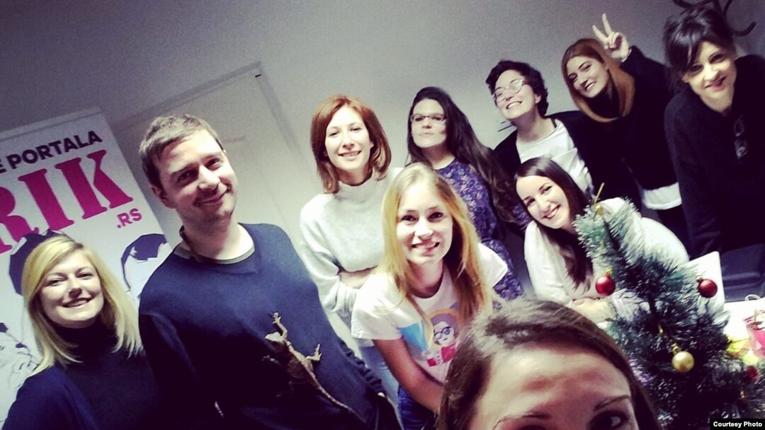 Staff members at investigative news outlet KRIK are seen in this undated photo. The site’s editor-in-chief says pro-government media in Serbia are trying to falsely link the media outlet to a criminal network. (Photo courtesy of KRIK) 