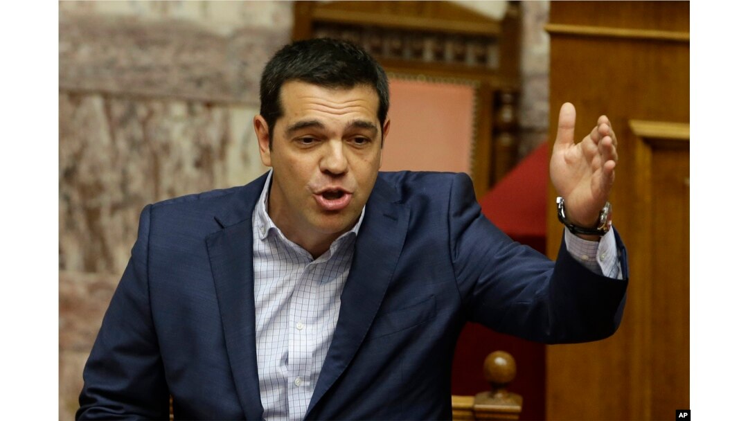 FILE - Greek Prime Minister Alexis Tsipras answers opposition questions in parliament in Athens, July 31, 2015.
