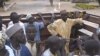 FILE - Nigerians formerly held hostage by Boko Haram militants arrive in Maroua, Cameroon, Dec. 5, 2015. They were freed by Cameroon’s military. 