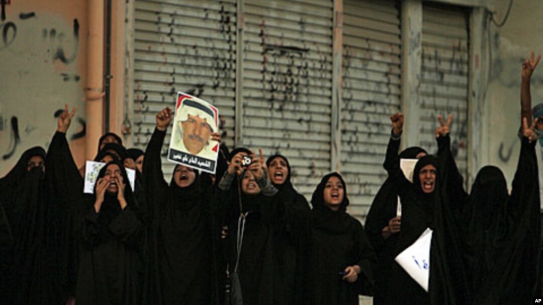 Bahraini women shout anti-government slogans in Sitra, August 31, 2011, during a demonstration shortly after the death of 14-year-old Ali Jawad Ahmad