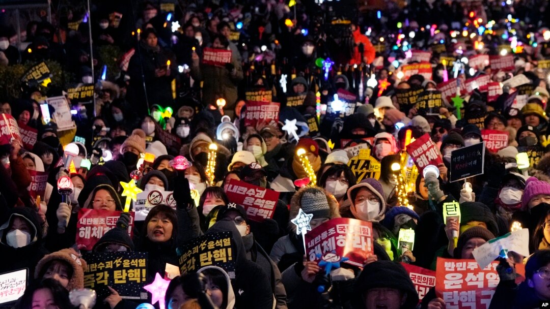 Participants stage a rally to demand South Korean President Yoon Suk Yeol's impeachment, outside the National Assembly in Seoul, South Korea, Dec. 13, 2024.