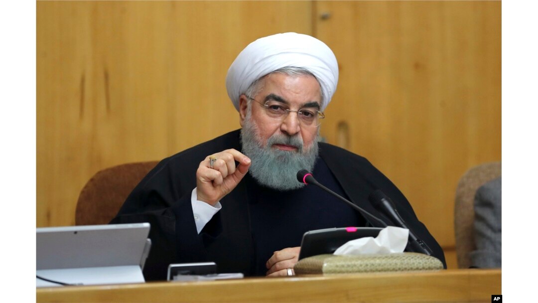 In this photo released by official website of the office of the Iranian Presidency, President Hassan Rouhani speaks in a cabinet meeting in Tehran. Dec. 31, 2017. After a wave of economic protests swept major cities in Iran, President Rouhnai said that people have the right to protest, but those demonstrations should not make the public "feel concerned about their lives and security."
