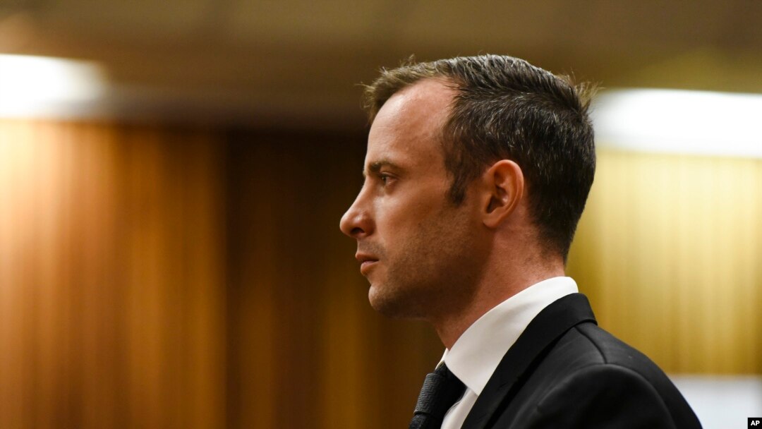 FILE - Oscar Pistorius pauses in the dock at the High Court in Pretoria, South Africa, Dec. 8, 2015.