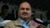 Iraqi Finance Minister Rafie al-Issawi attends an anti-government demonstration in Ramadi, 100 km (62 miles) west of Baghdad, March 1, 2013.