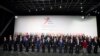 Leaders pose for a group photo during the Asia-Europe summit in Milan, Italy, October 16, 2014.