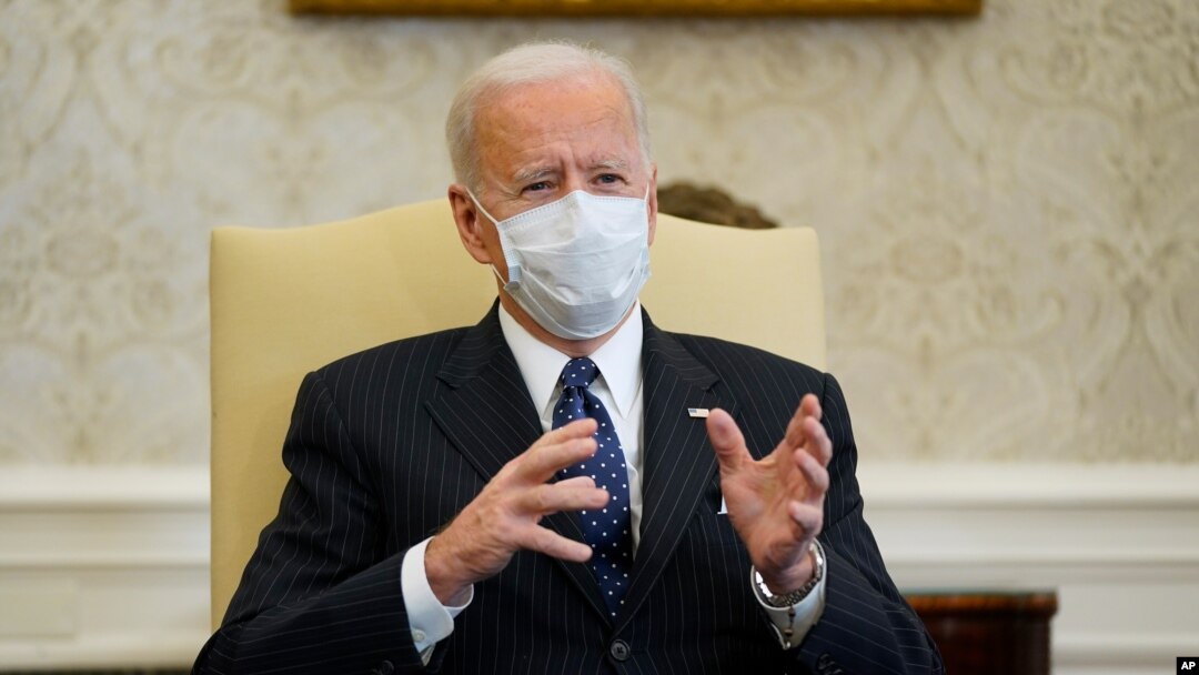 FILE - President Joe Biden meets with business leaders to discuss a coronavirus relief package in the Oval Office of the White House in Washington, Feb. 9, 2021.