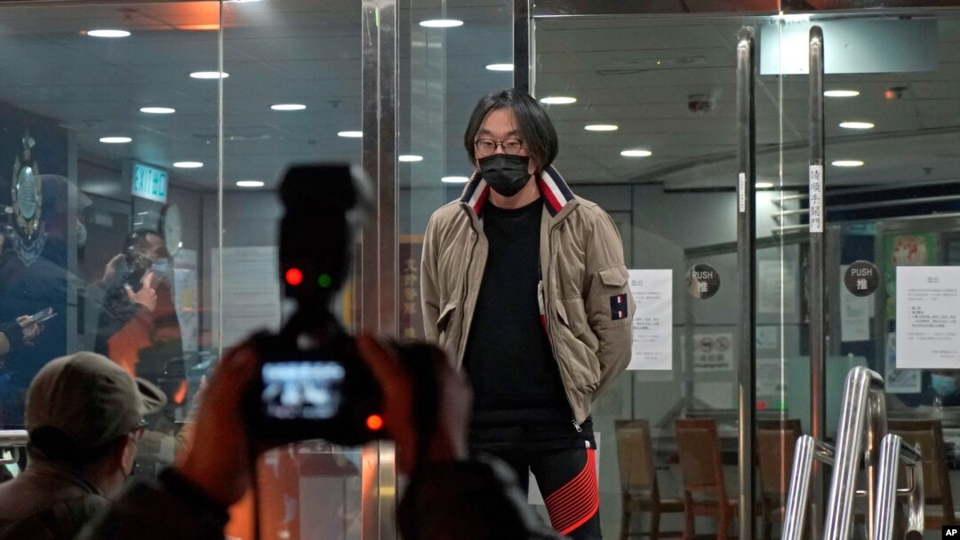 Mike Lam King-nam, who participated in the pro-democracy primary elections, walks out at a police station after being bailed out in Hong Kong, Jan. 7, 2021.