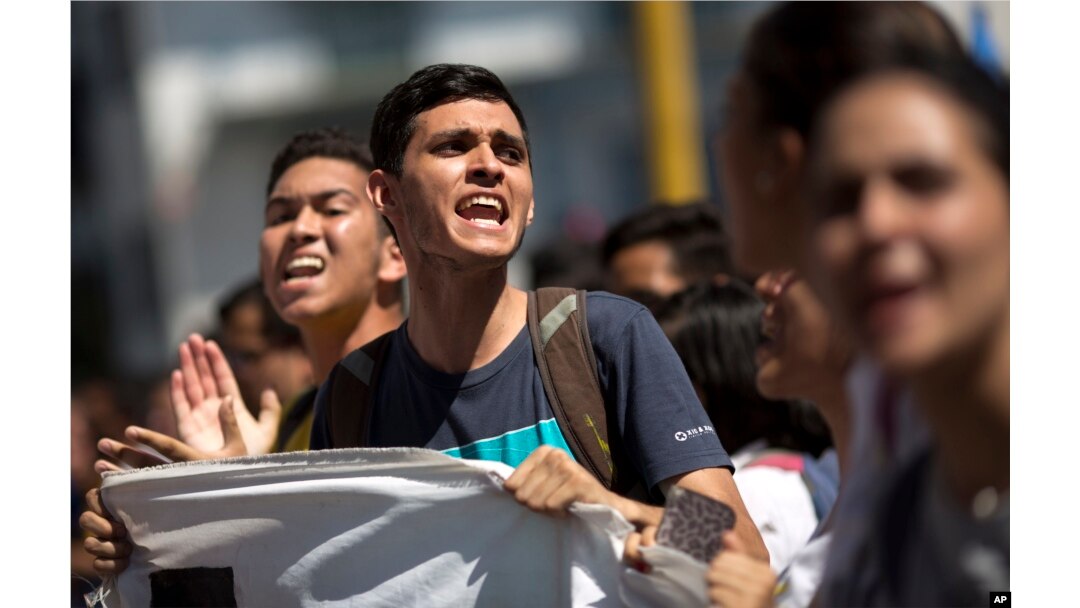 University students protest against President Nicolas Maduro in Caracas, Venezuela, Nov. 3, 2016.