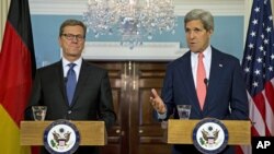 Secretary of State John Kerry (r) during a news conference with German Foreign Minister Guido Westerwelle at the State Department in Washington, May 31, 2013. 