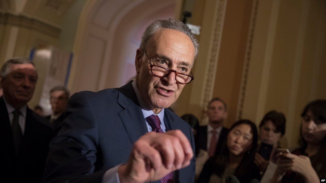 Senate Minority Leader Charles Schumer, D-N.Y., reacts to questions from reporters about President Donald Trump's reported sharing of classified information with two Russian diplomats during a meeting in the Oval Office, May 16, 2017, on Capitol Hill in Washington.