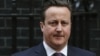 Britain's Prime Minister David Cameron leaves Number 10 Downing Street to attend Prime Minister's Questions at parliament in London January 16, 2013.