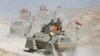 Peshmerga forces advance in the east of Mosul to attack Islamic State militants in Mosul, Iraq, Oct. 18, 2016. 