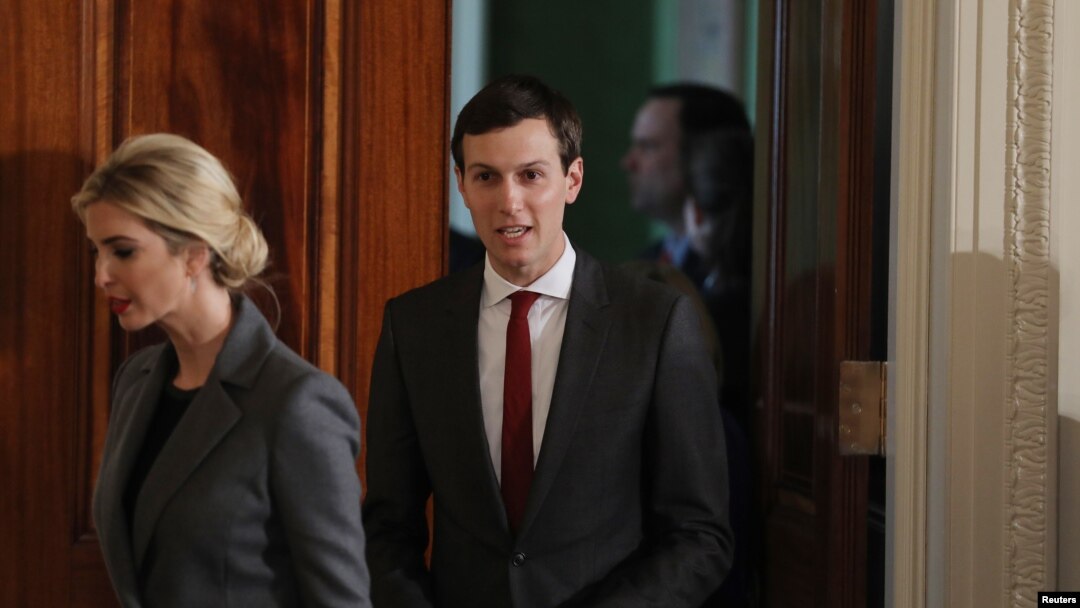 FILE - White House senior advisor Jared Kushner enters the East Room with his wife Ivanka Trump, prior to a joint news conference between President Donald Trump and Israeli Prime Minister Benjamin Netanyahu, at the White House in Washington, Feb. 15, 2017. 