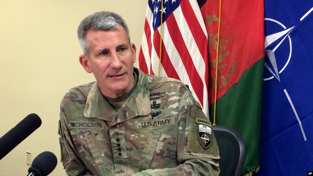 FILE - Gen. John Nicholson, the top American commander in Afghanistan, speaks to reporters at Bagram air base north of Kabul, Afghanistan, March 14, 2018.