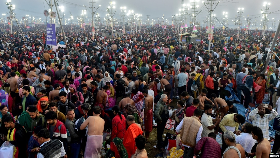 Devotees gather to take a dip at the confluence of the Ganges and Yamuna rivers during the Maha Kumbh Mela, or the Great Pitcher Festival, in Prayagraj, India, on Feb. 12, 2025.