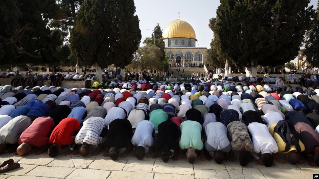 Palestinians pray inside the al-Aqsa Mosque compound in Jerusalem's Old City, July 27, 2017. Anticipated unrest there Friday did not materialize.