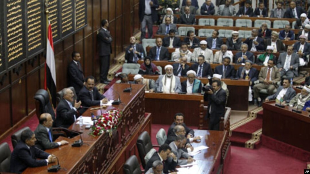 Yemeni President Ali Abdullah Saleh (3rd l) addresses the parliament in Sana'a, February 2, 2011
