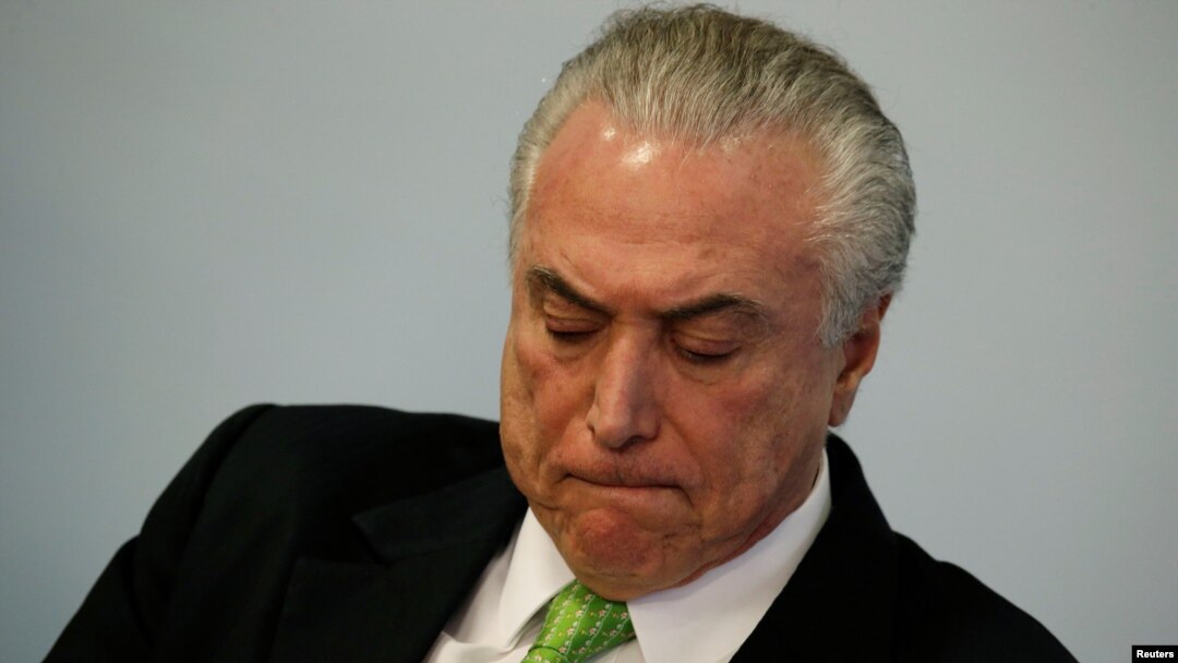 Brazil's President Michel Temer reacts during a ceremony in commemoration of the World Environment Day, at the Planalto Palace in Brasilia, Brazil, June 5, 2017. 