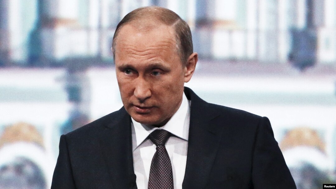 FILE - Russian President Vladimir Putin speaks during a session of the St. Petersburg International Economic Forum 2015, St. Petersburg, Russia, June 19, 2015.