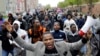 The Rev. Westley West leads a march for Freddie Gray to the Baltimore Police Department's Western District police station, April 22, 2015.