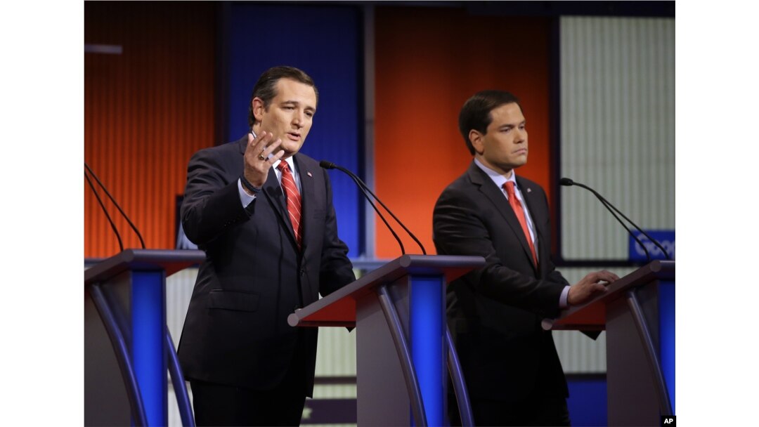 FILE - Ted Cruz speaks as Marco Rubio listen during a Republican presidential primary debate.
