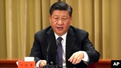 Chinese President Xi Jinping speaks during an event to commemorate the 40th anniversary of the Message to Compatriots in Taiwan at the Great Hall of the People in Beijing, Jan. 2, 2019. 