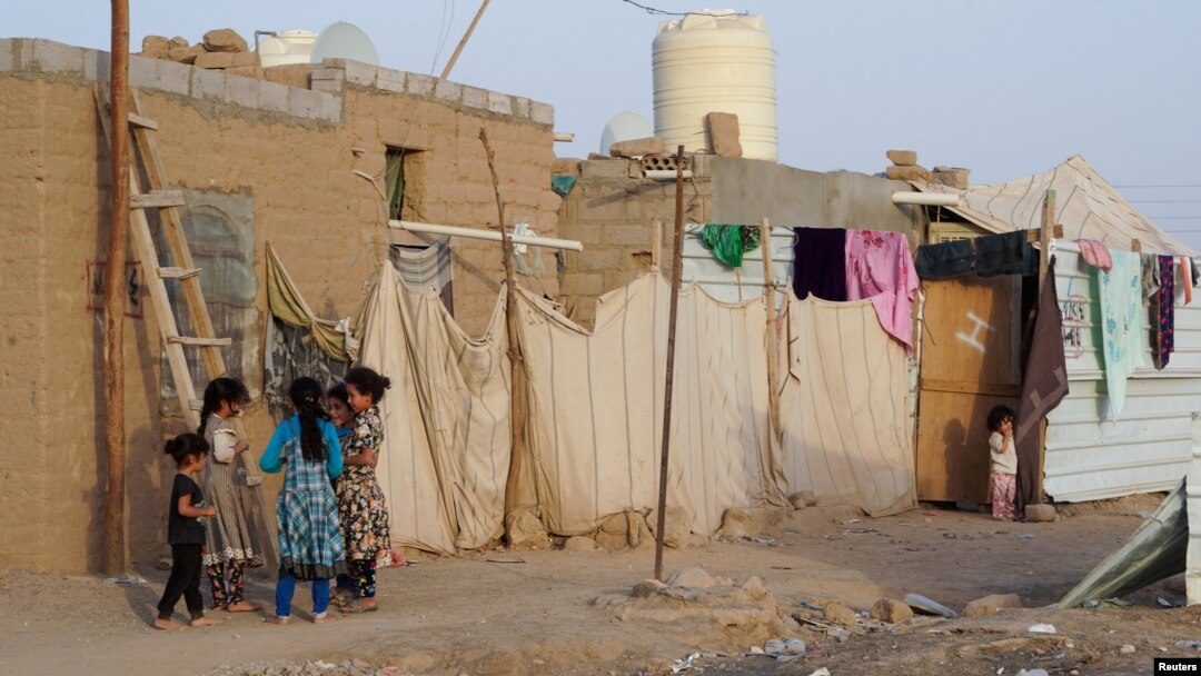 Girls play at a makeshift camp for internally displaced people (IDPs) in the oil-producing Marib province, Yemen May 10, 2021.