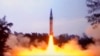 FILE - In this image made from Indian Ministry of Defense video, India's the Agni-V missile is launched from Wheeler Island off India's east coast, April 19, 2012.